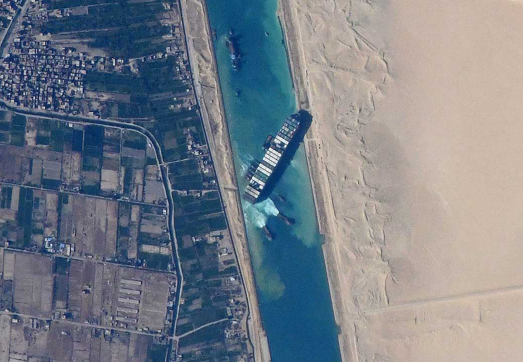 1040px-Ever_Given_in_Suez_Canal_viewed_from_ISS.jpg