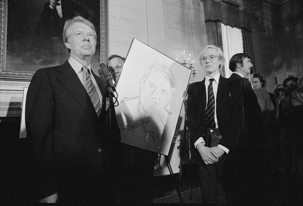1056px-Jimmy_Carter_with_Andy_Warhol_during_a_reception_for_inaugural_portfolio_artists.jpg